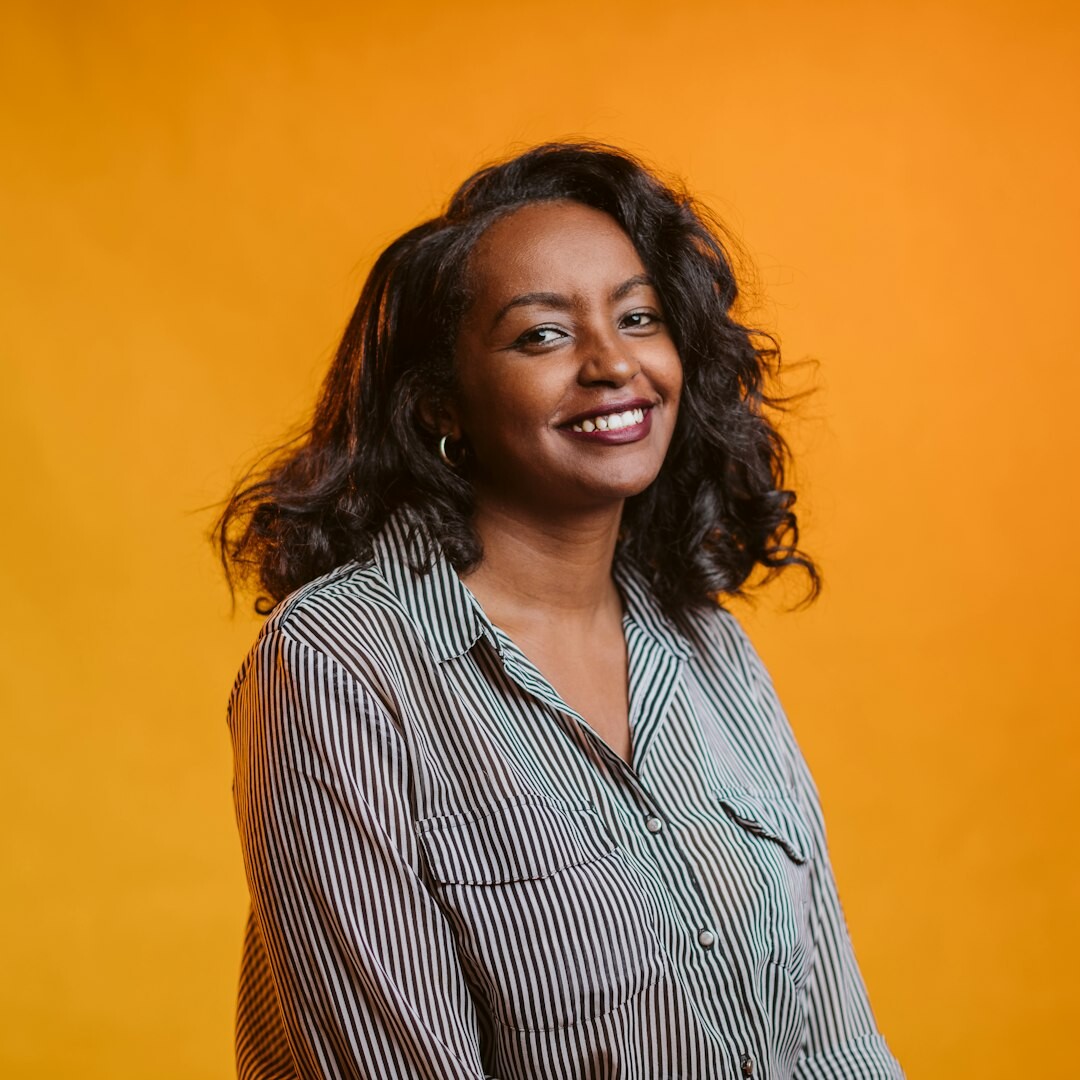 Studio portrait of a Sub-Saharan African businesswoman smiling