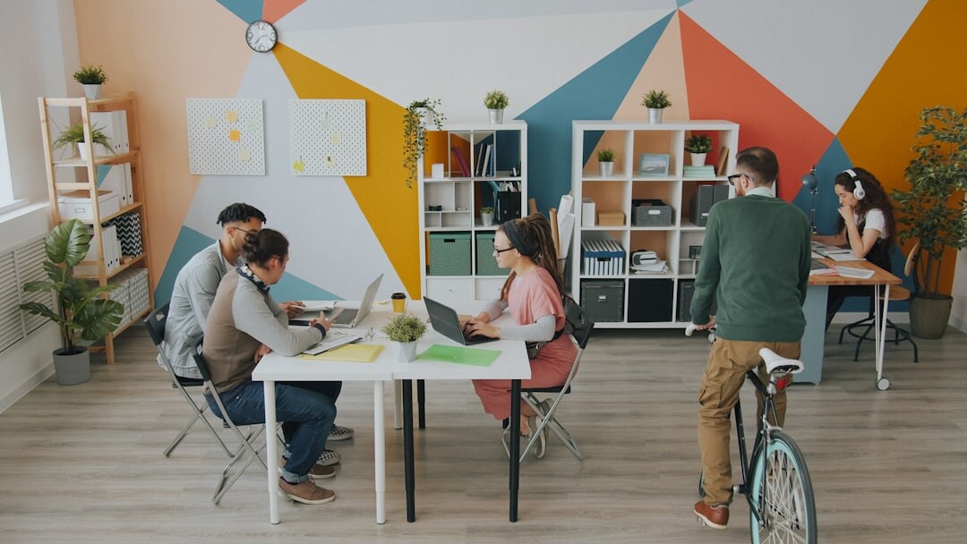 Group of diverse entrepreneurs collaborating in a bright coworking space